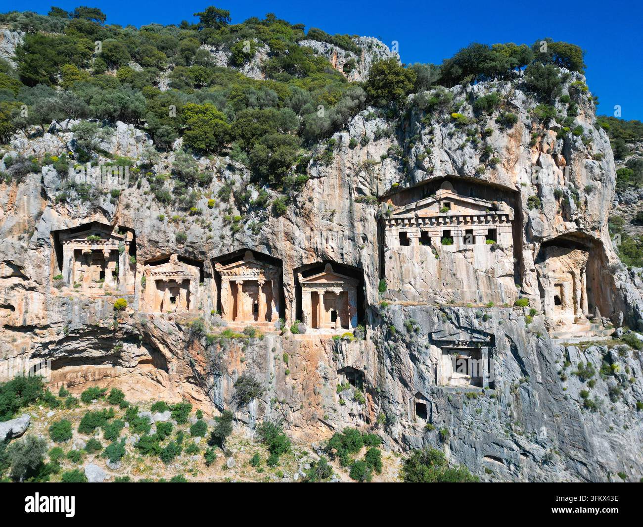 Aerial View Rocks Aerial view of the ancient Lycian rock tombs carved into the cliff face ...