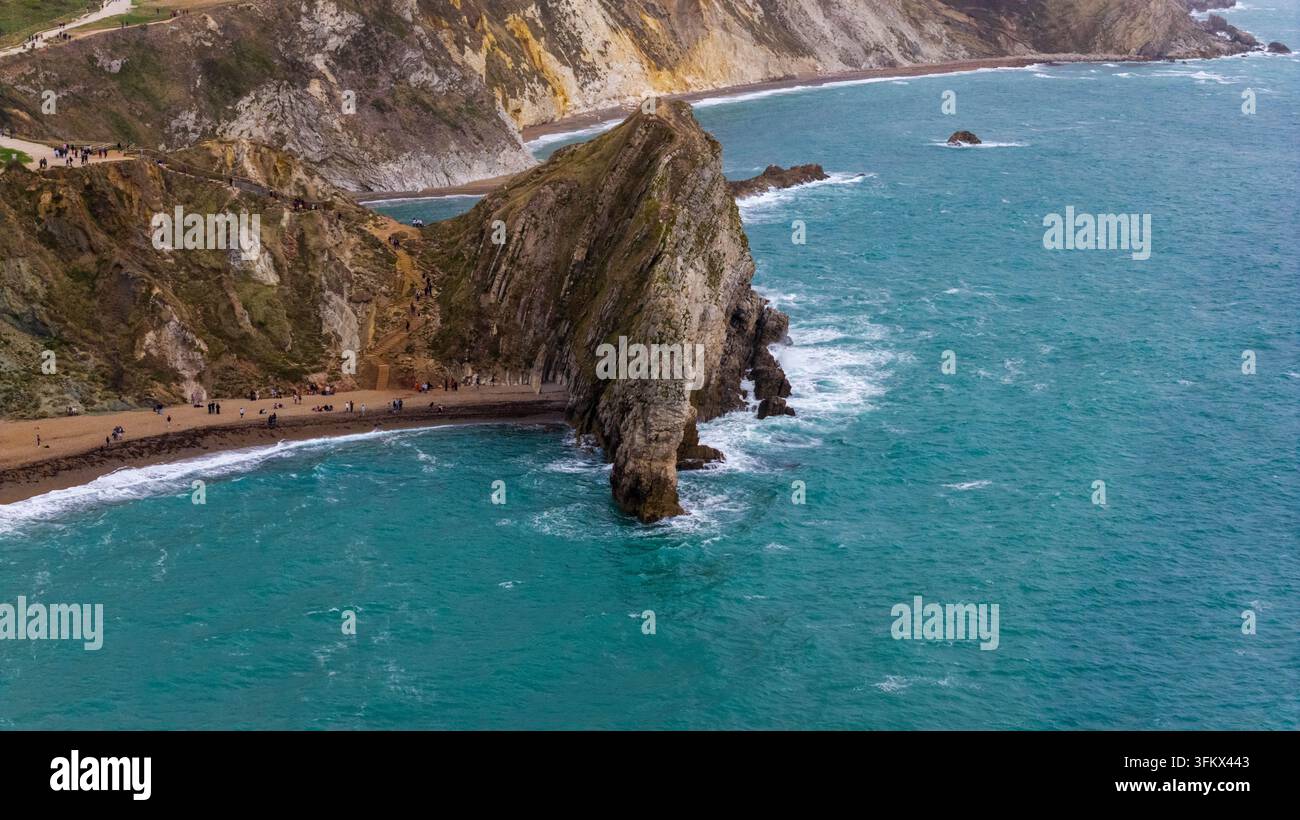 Aerial view of Durdle Door, a natural limestone arch on the Jurassic ...