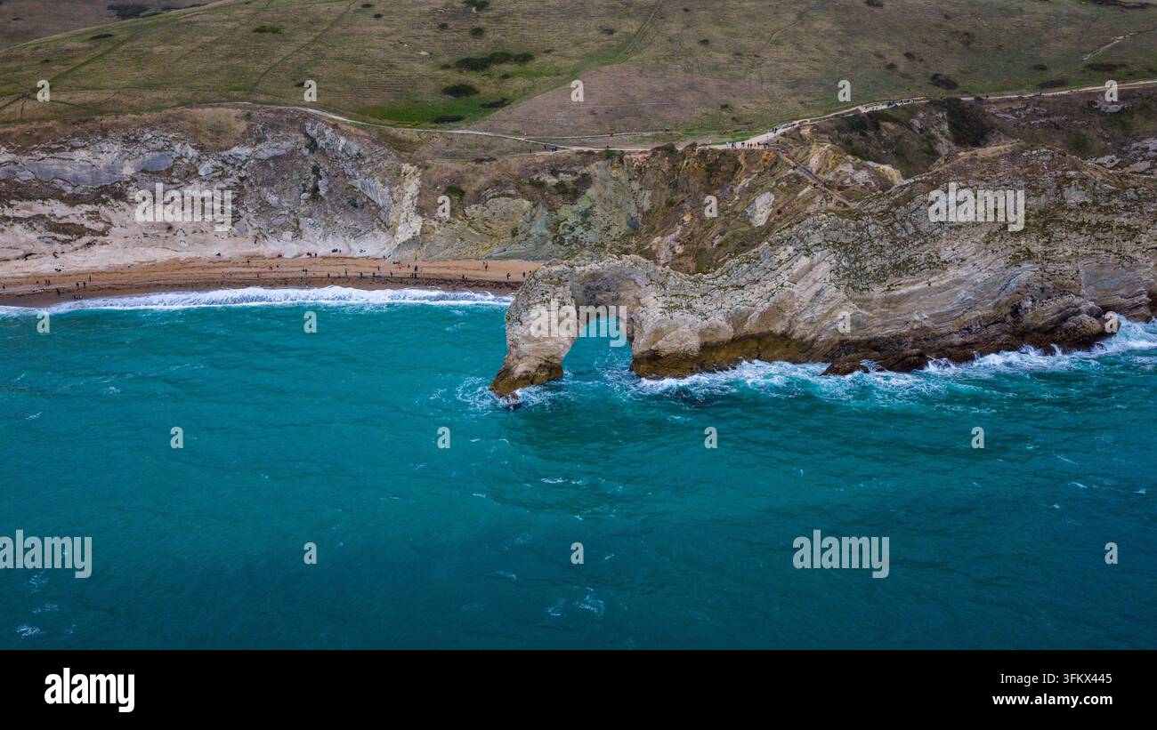 Aerial view of Durdle Door, a natural limestone arch on the Jurassic ...