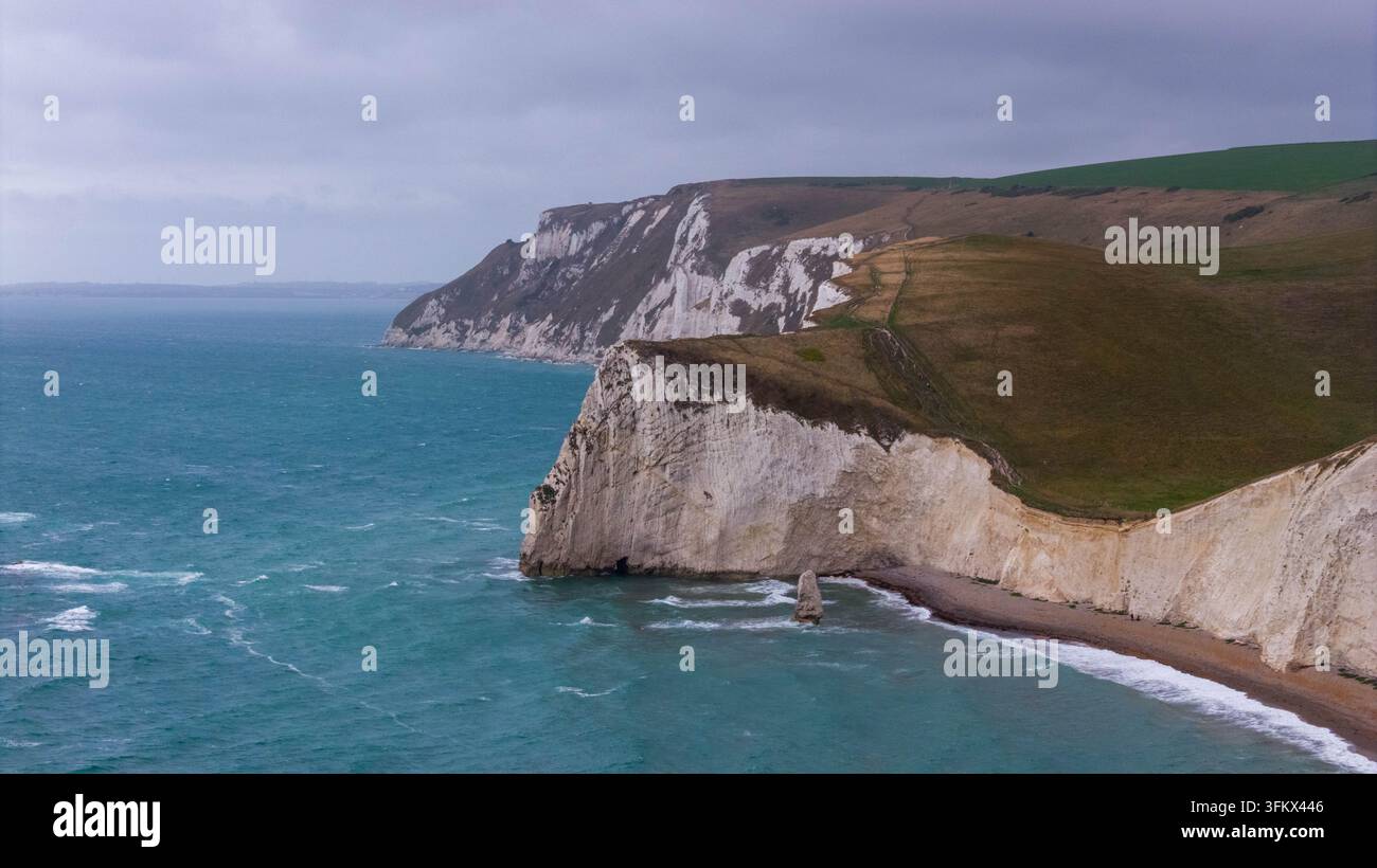 Aerial view of Durdle Door limestone arch on the Jurassic Coast with ...