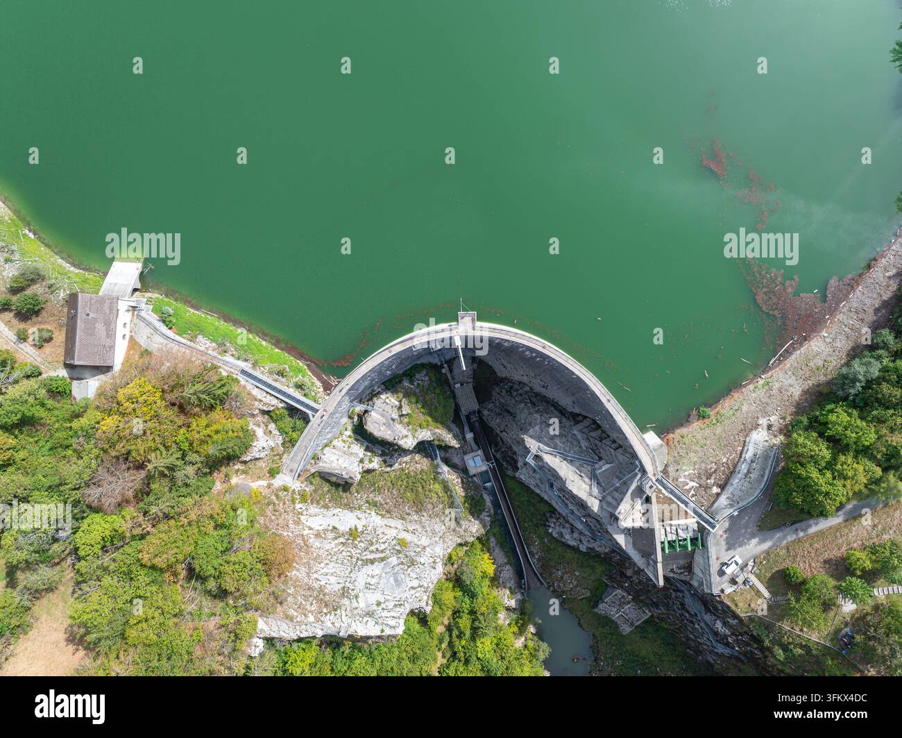 Aerial view of Barrage de Montsalvens arch dam with its curved concrete ...