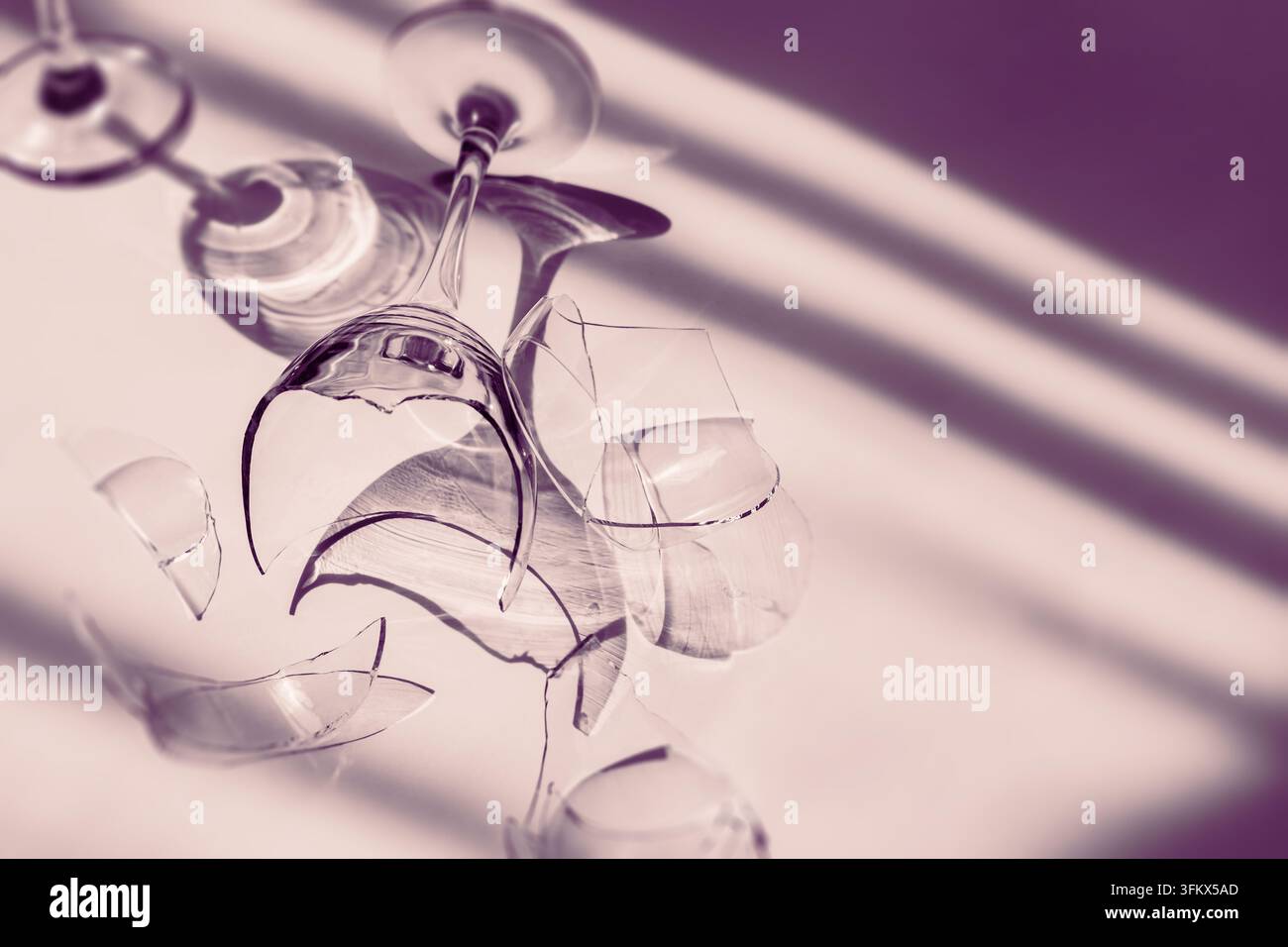 Artistic composition of shattered glass and geometric shadows creating ...
