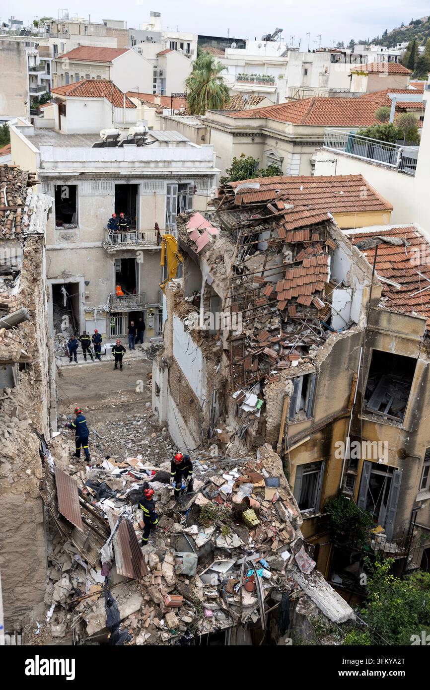 Rescuers work at the scene following Friday's powerful blast in Athens ...