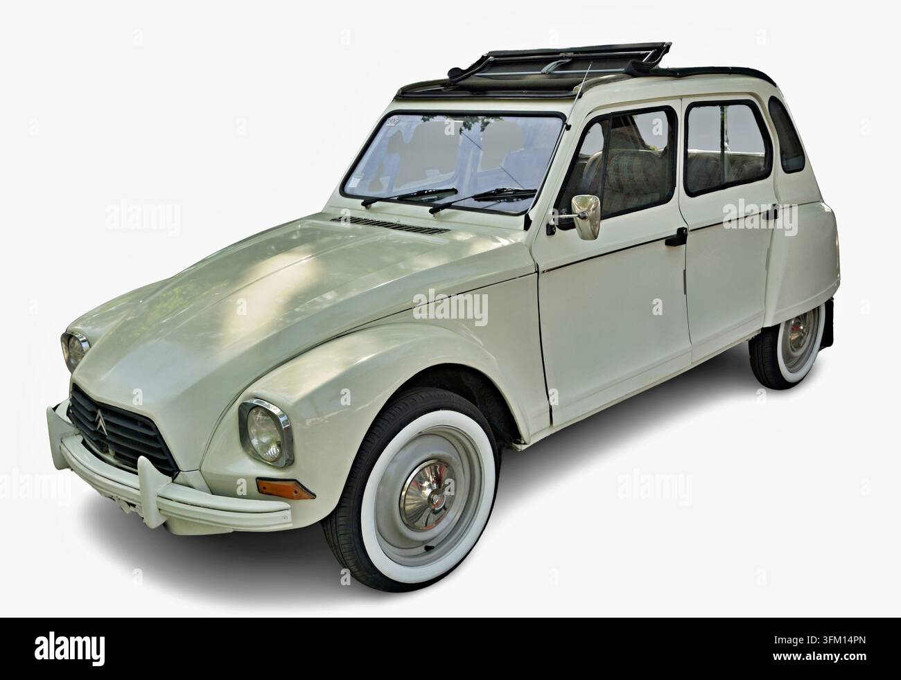 White Citroen Dyane hatchback with a sunroof and whitewall tires Stock Photo