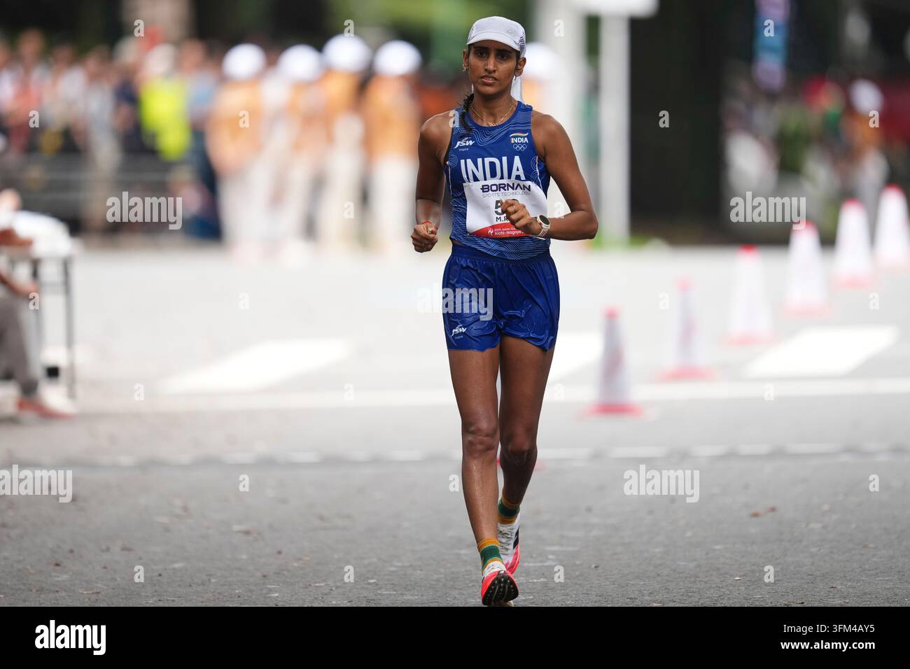 India's Manju Rani competes in the women's marathon walk at the Asian ...