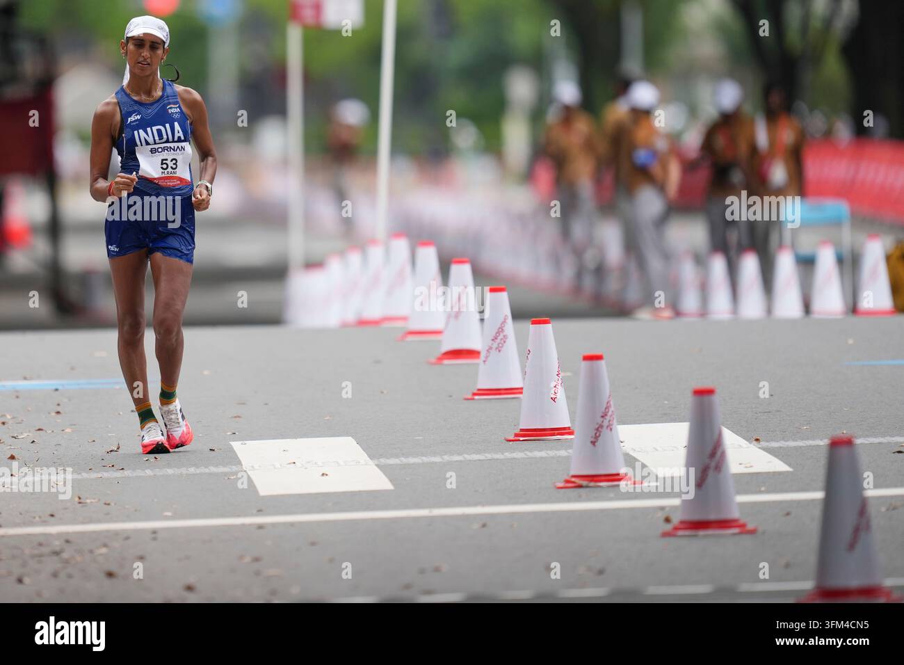 India's Manju Rani competes in the women's marathon walk at the Asian ...