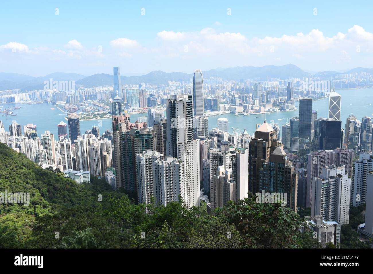 Towering skyscrapers line both sides of Victoria Harbour in Hong Kong ...