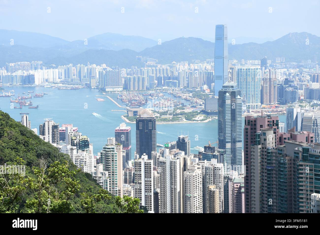 Towering skyscrapers line both sides of Victoria Harbour in Hong Kong ...