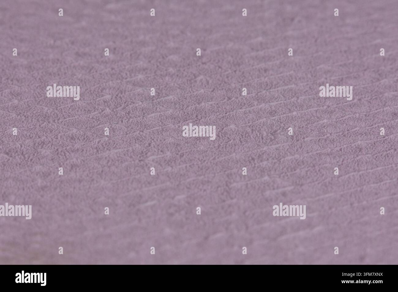 Embossed Purple expanded foam Surface with Repeating Texture Macro Stock Photo
