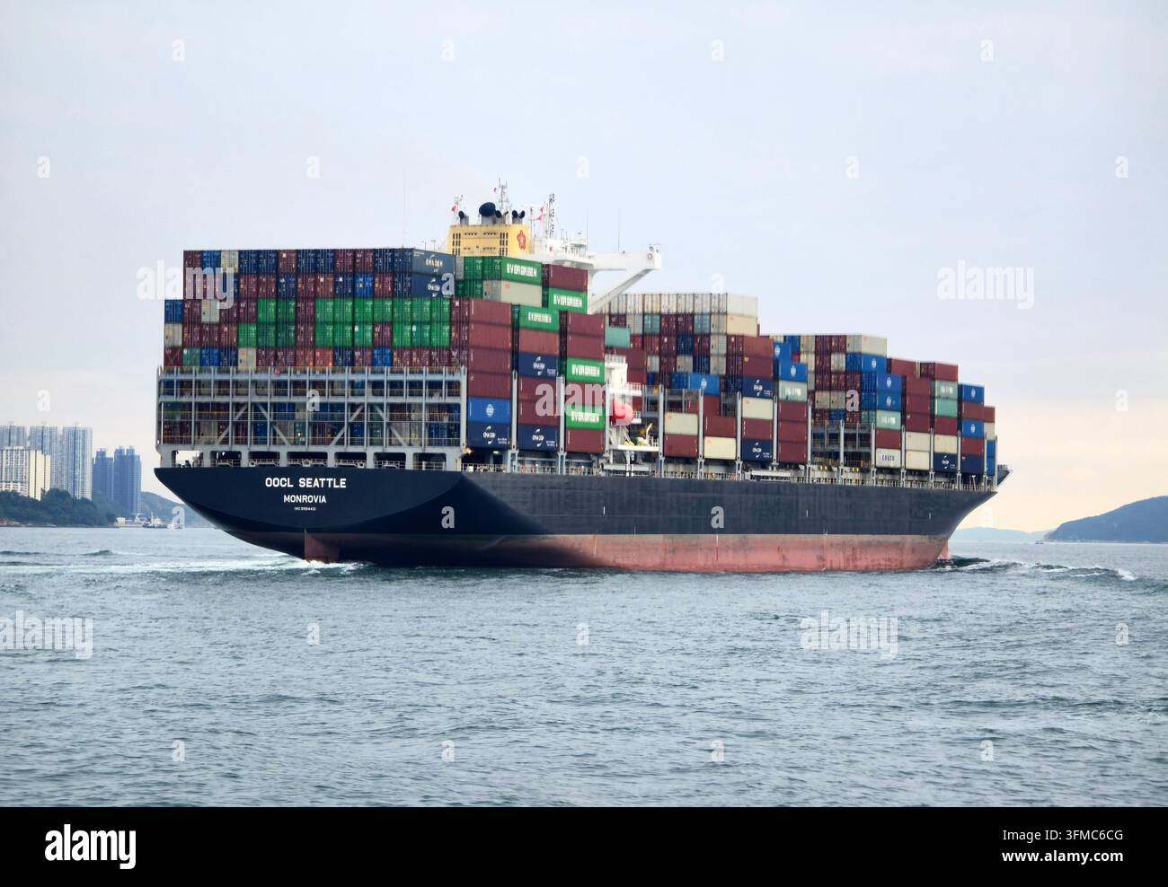 The oocl Seatle Monrovia container ship crossing the East Lamma Channel in Hong Kong. - Smartphone Captured Stock Image