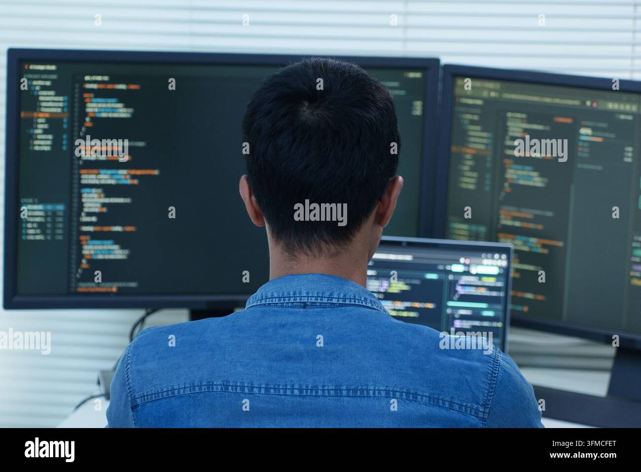 Programmer Developing Software with Code and Digital Technology Stock Photo