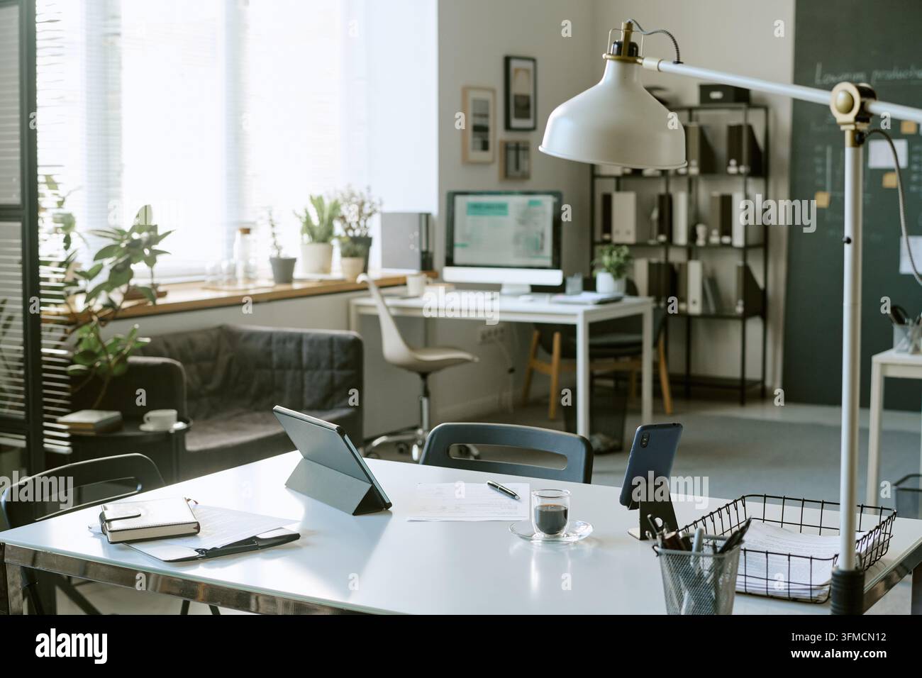 Modern Empty Coworking Space in Bright Open Office Interior Stock Photo