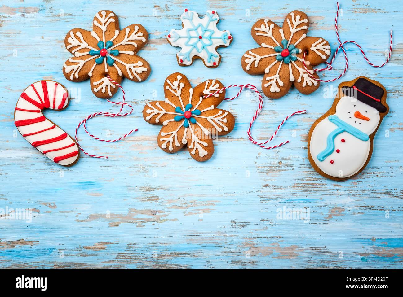 Assorted homemade Christmas cookies on a blue wooden background Stock Photo