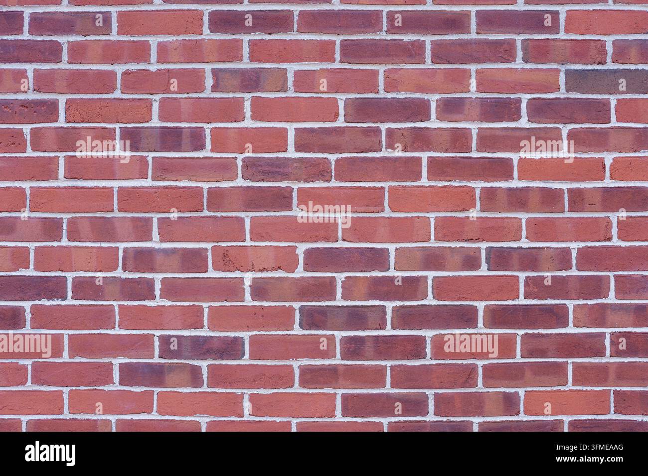 Background from a wall of clean red bricks Stock Photo