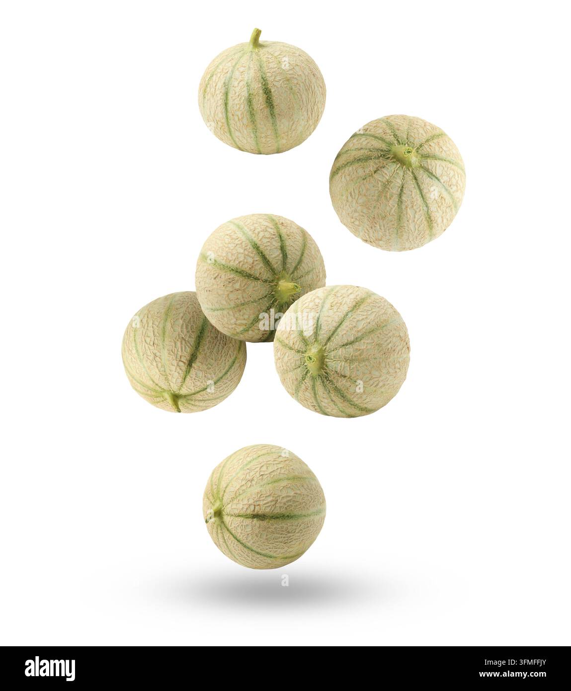 Fresh cantaloupe melons falling on white background Stock Photo