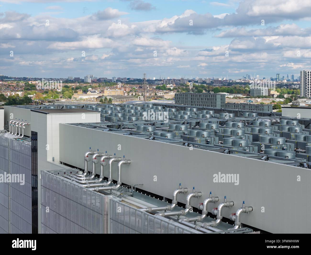 Data Center Rooftop Aerial view of a large data center rooftop featuring numerous ...