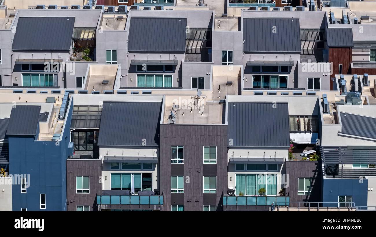 Aerial view of modern residential apartment buildings with dark metal ...
