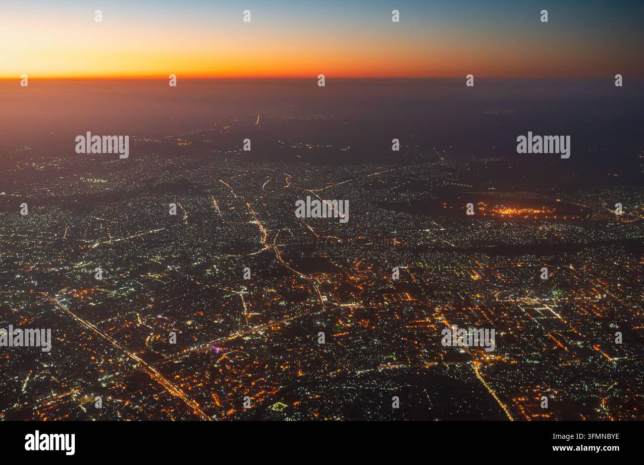 Aerial view of the sprawling urban landscape of Karachi at night, with ...