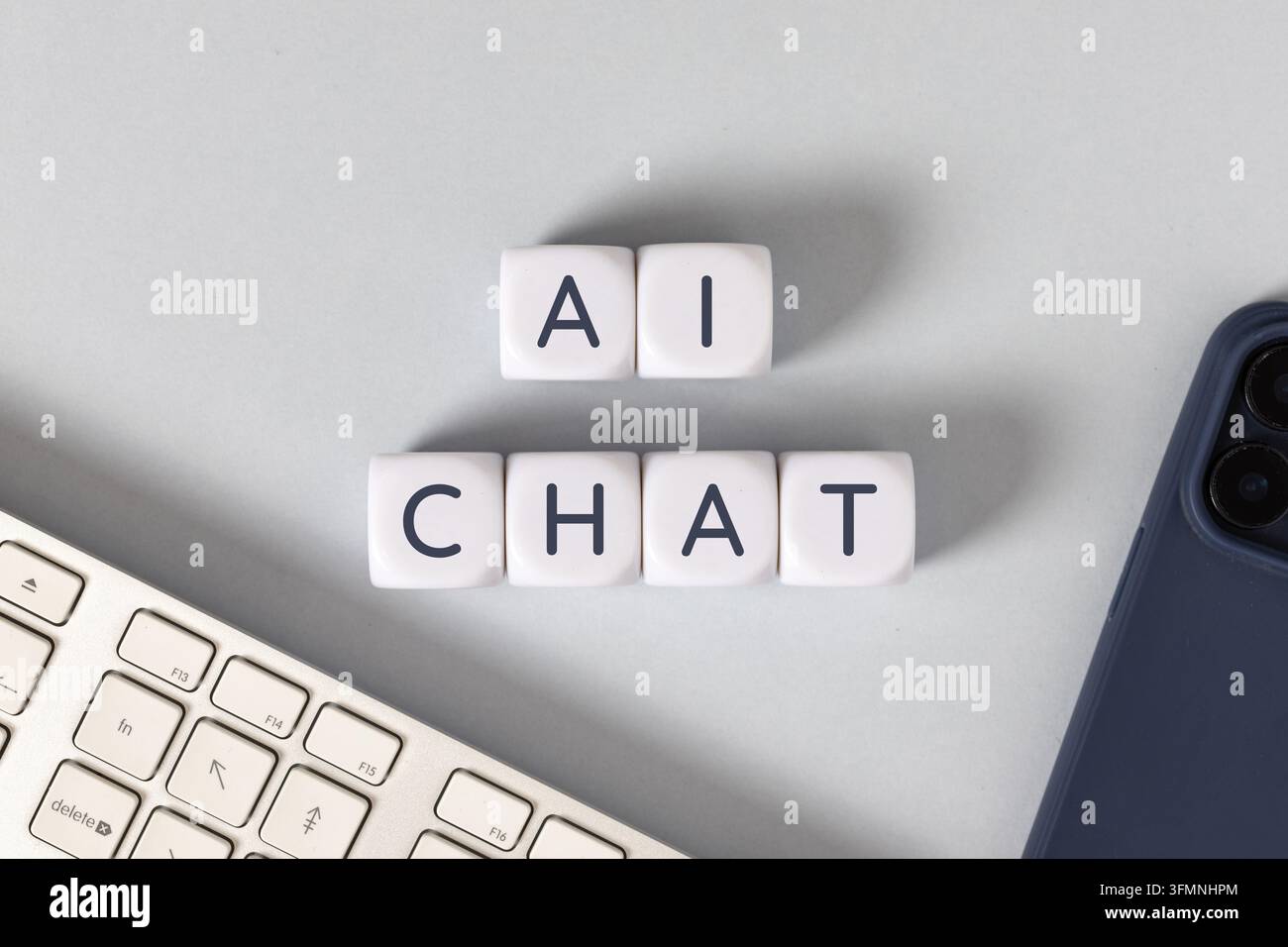AI chat text on white cubes Stock Photo