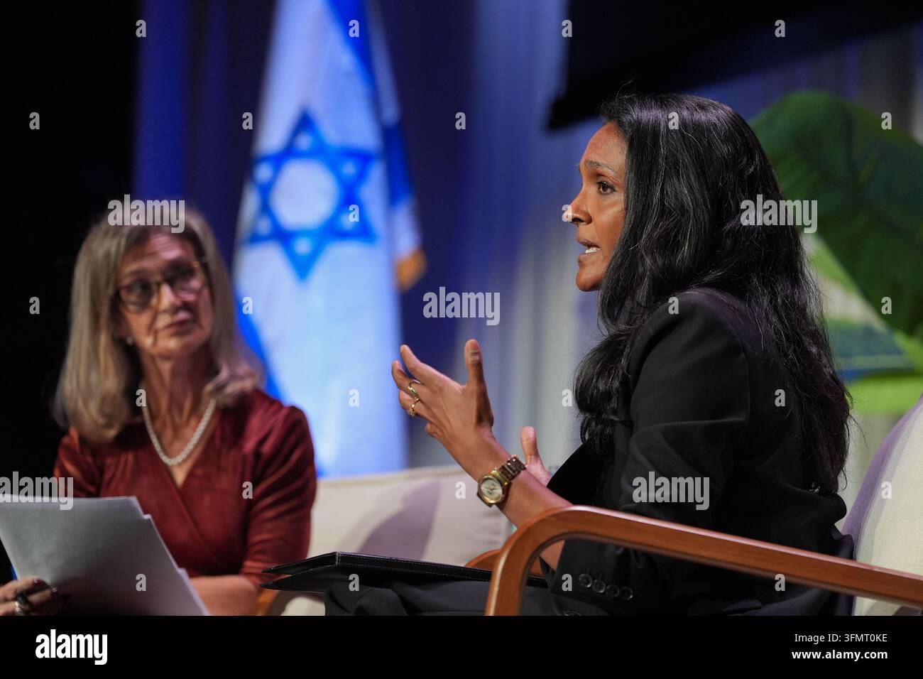 Nithay Raman Los Angeles mayoral candidate Nithya Raman, right, speaks as she is ...