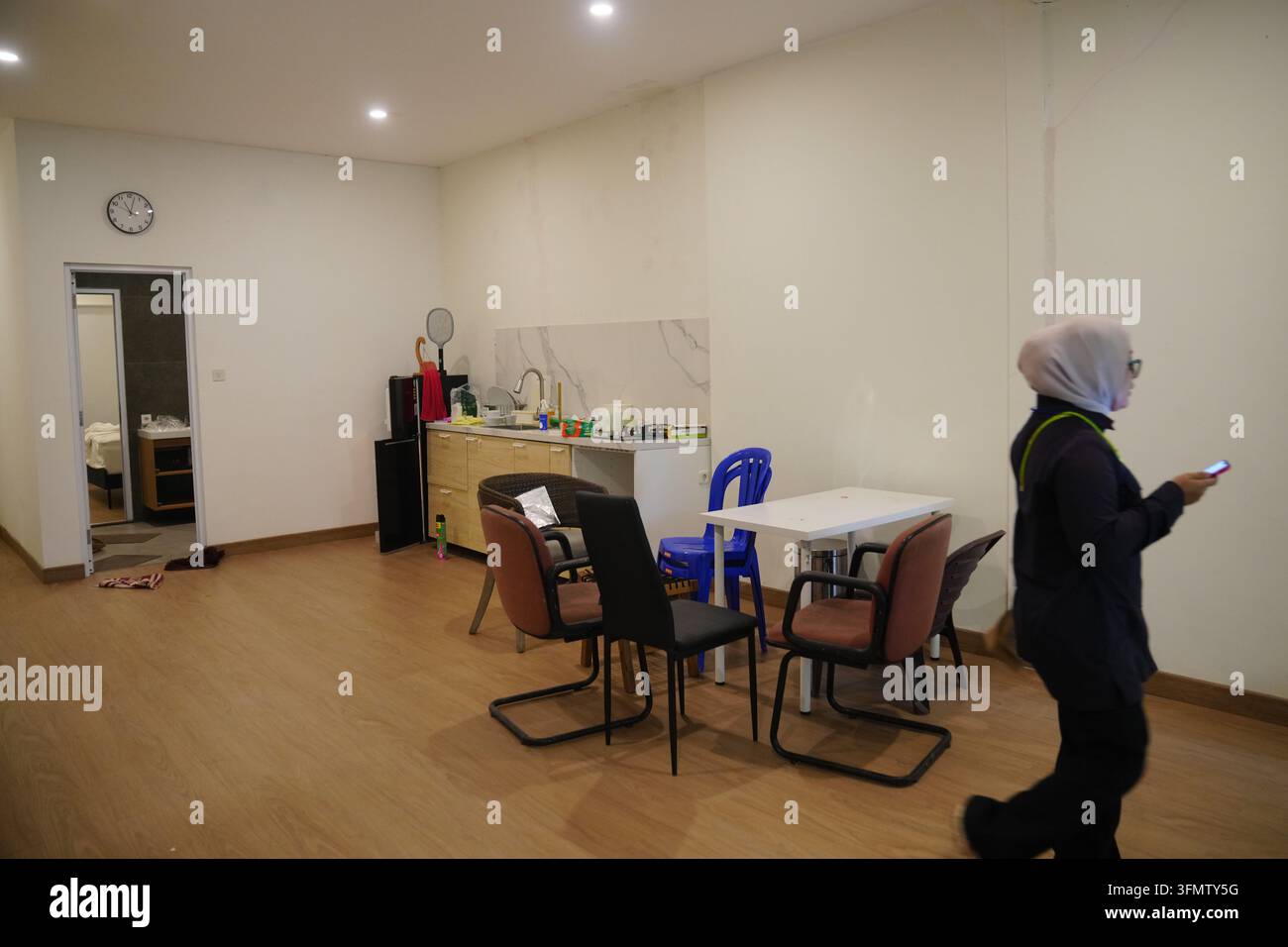 A woman walks inside a controversial luxury compound at a penitentiary ...