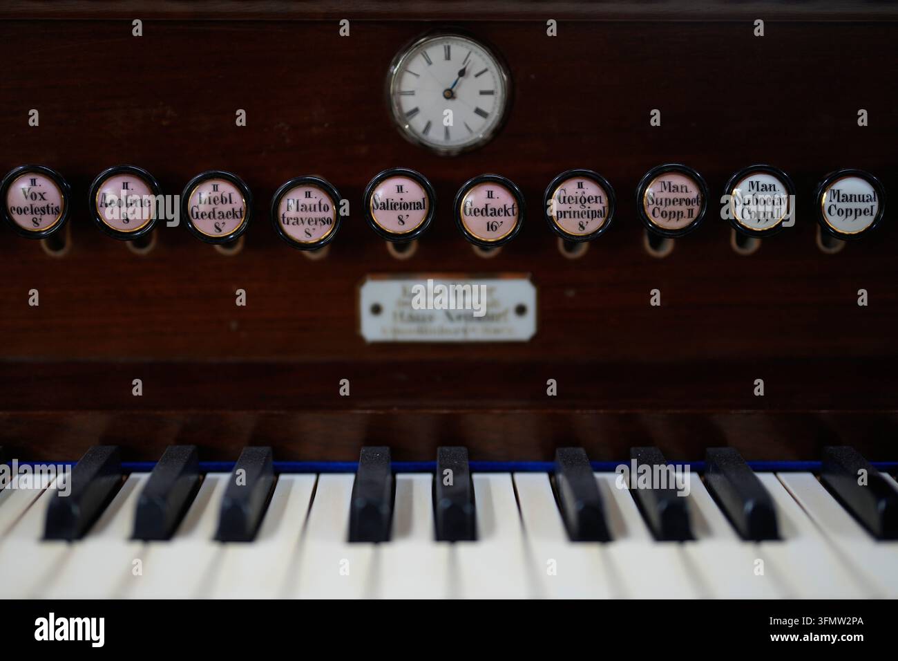 Details of old organ keys and stops are pictured in the work shop of ...