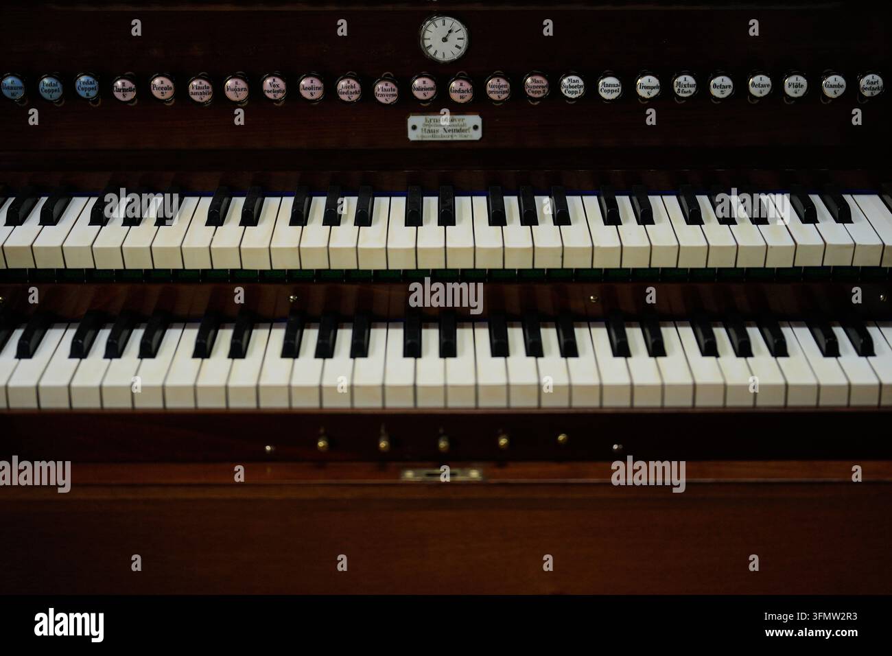 Details of old organ keys and stops are pictured in the work shop of ...