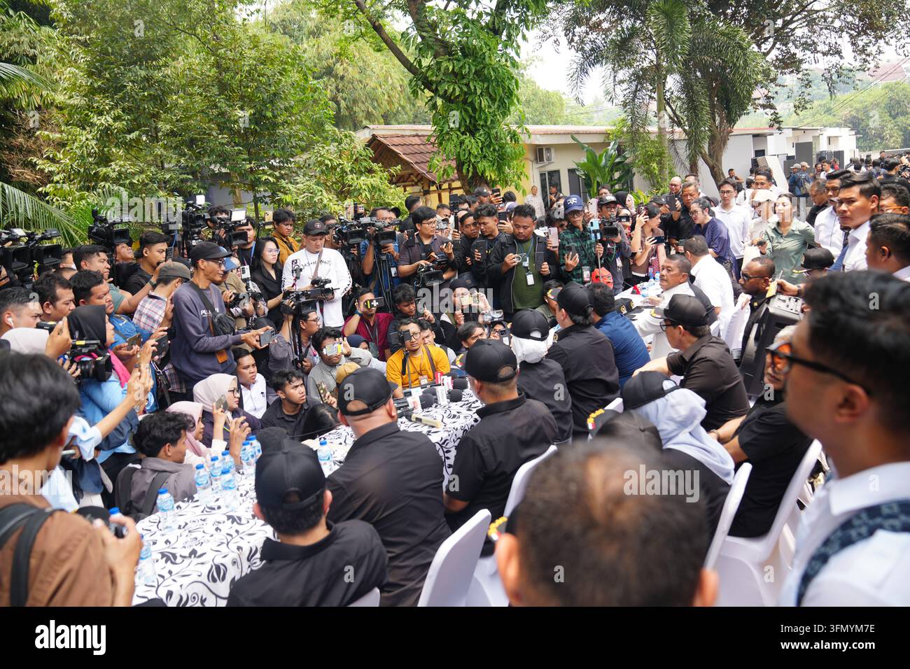 Lawmakers and prison officials speak to journalists following an ...