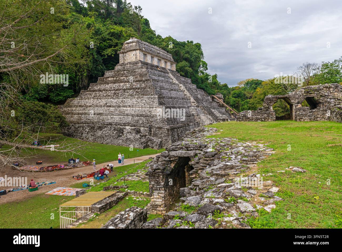 Tourists people buying souvenirs by the Temple of Inscriptions, Palenque, Chiapas, Mexico. Stock Photo