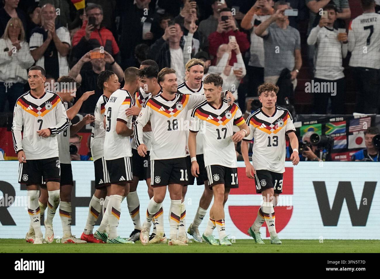Germany's Florian Wirtz celebrates with teammates after scoring his side's second goal during ...