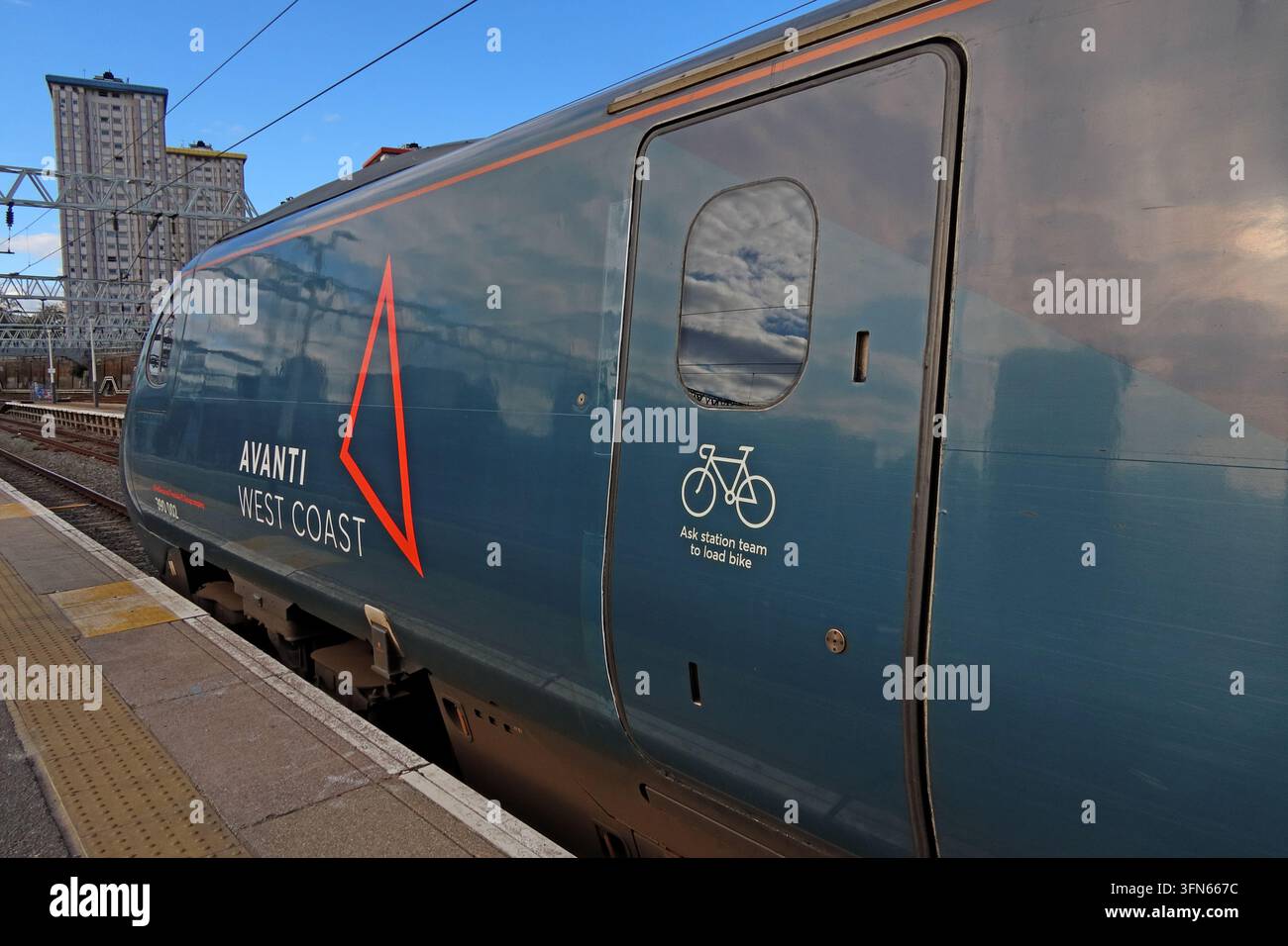 Avanti West Coast Pendolino 390002 bicycle loading area at London Euston, showing the dedicated cycle compartment door. Stock Photo