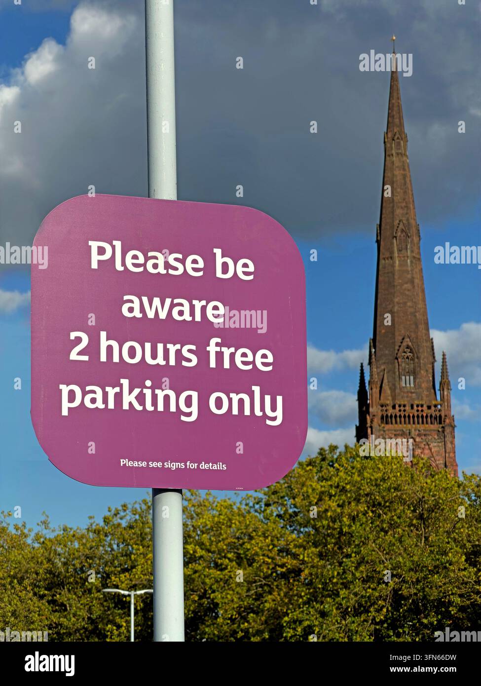 Two hours free parking sign at Sainsbury's in Warrington, warning shoppers that parking time limits and penalties apply. Stock Photo