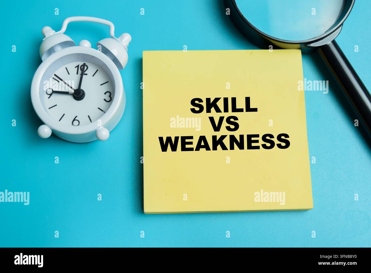 Concept of skill vs weakness write on sticky notes isolated on table. Stock Photo