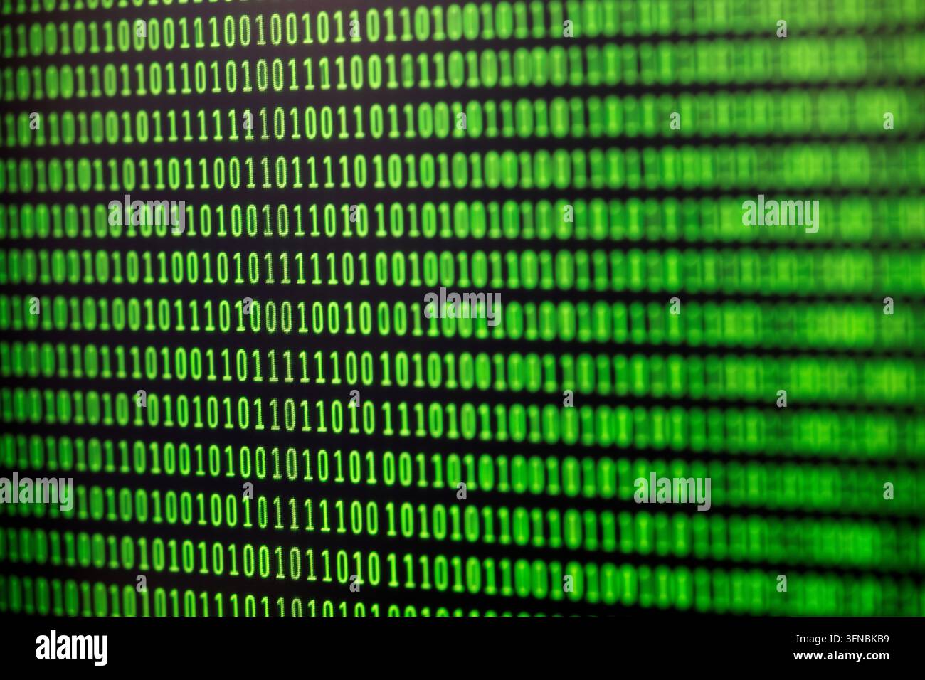 Binary code background on computer screen Stock Photo