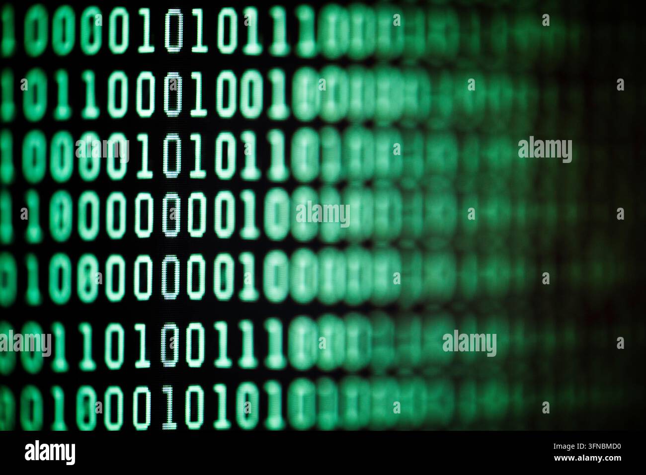Binary code background on computer screen Stock Photo