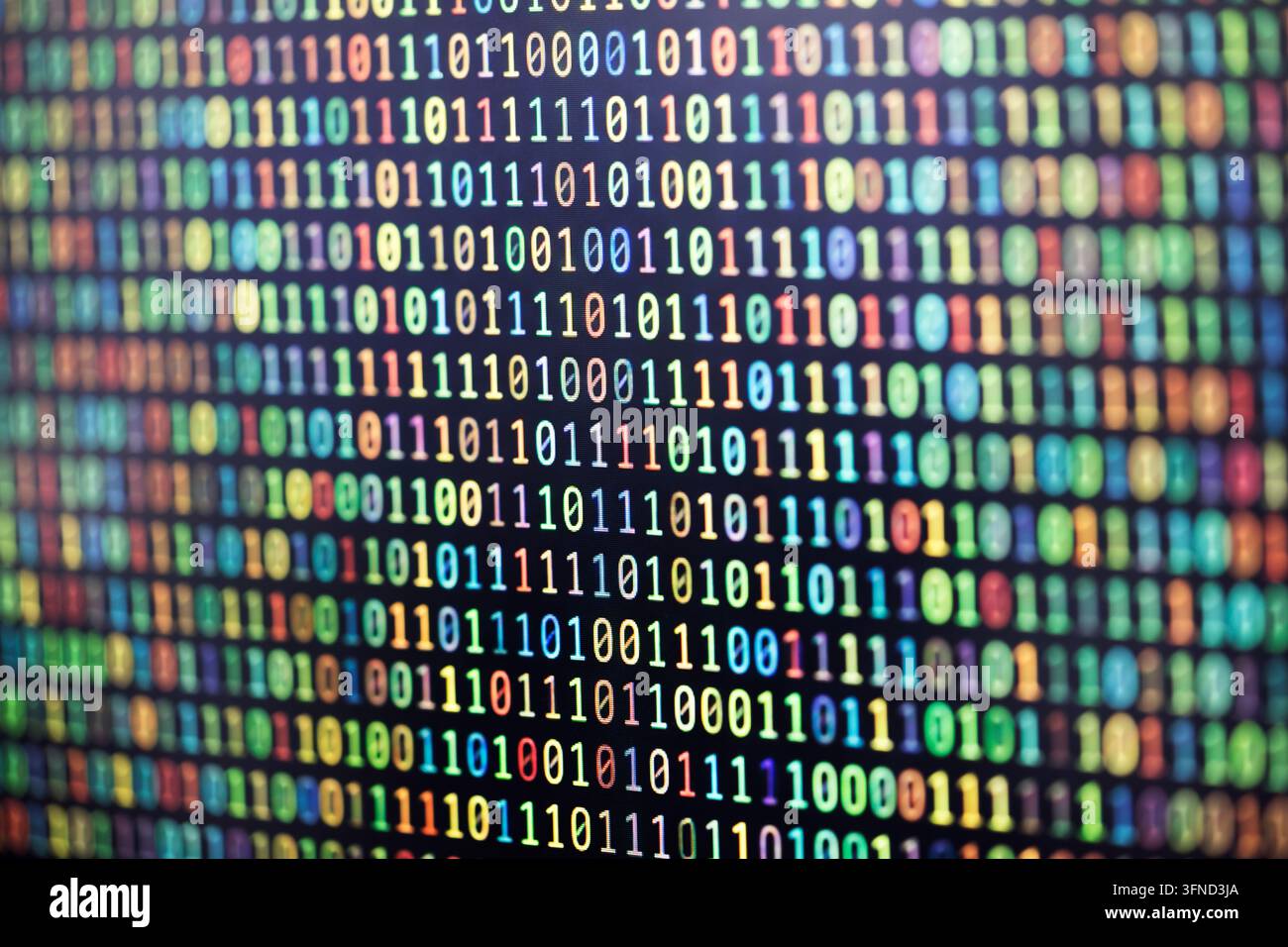 Colorful binary code background on computer screen Stock Photo