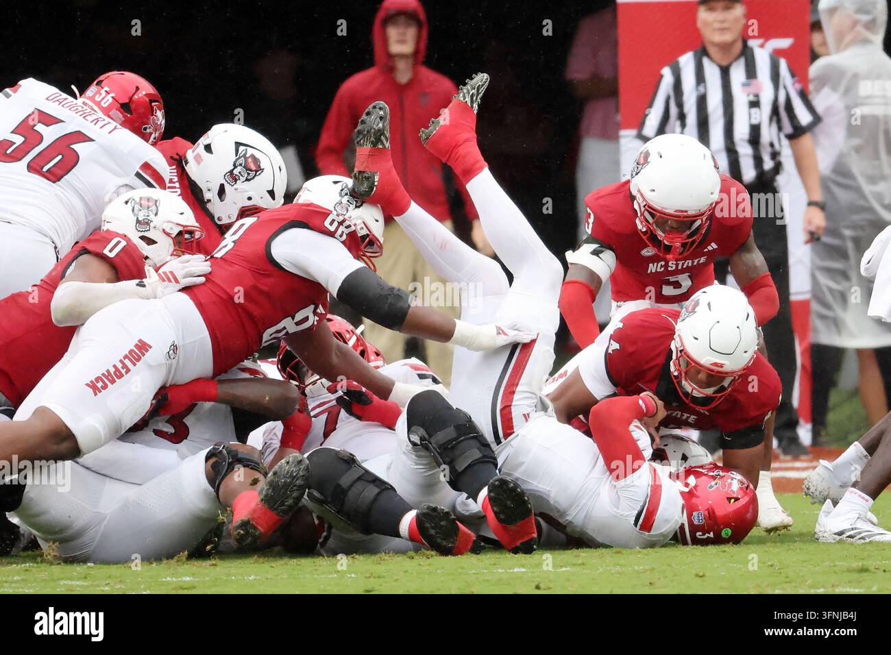 Short Line Model Louisville quarterback Lincoln Kienholz (3) is stopped on a fourth and ...