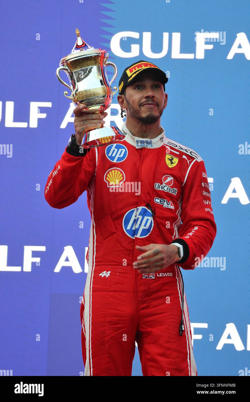 Lewis Hamilton (GBR) Scuderia Ferrari celebrates his second position on ...