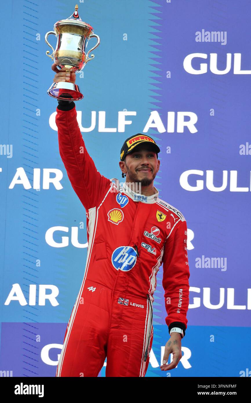 Lewis Hamilton (GBR) Scuderia Ferrari celebrates his second position on ...