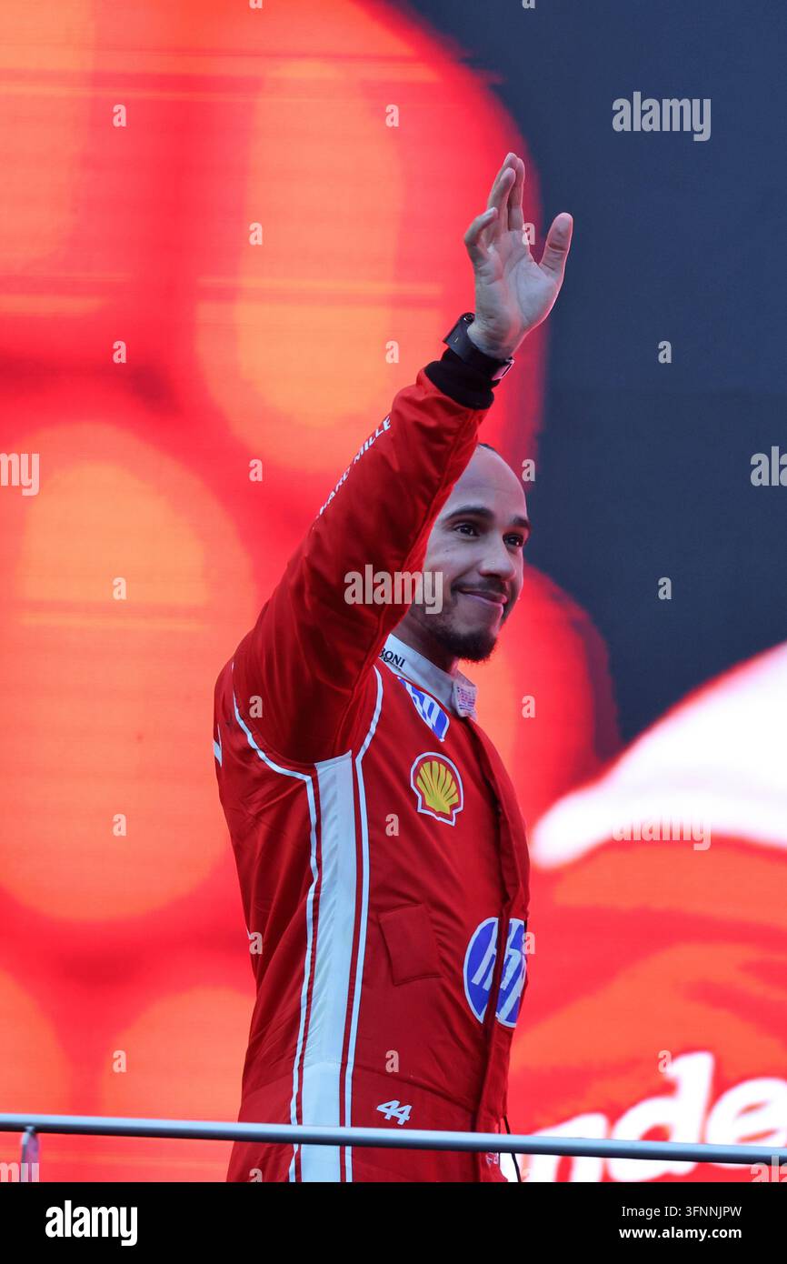 Lewis Hamilton (GBR) Scuderia Ferrari celebrates his third position on ...