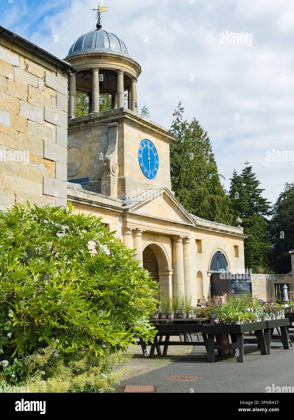 Clock tower and courtyard at Wallington estate stable block in Northumberland - Smartphone Captured Stock Image