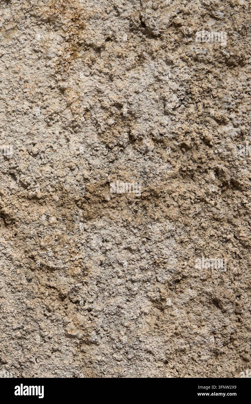 Rough Beige Stucco Wall Texture Background with Natural Weathered Plaster Surface. Stock Photo