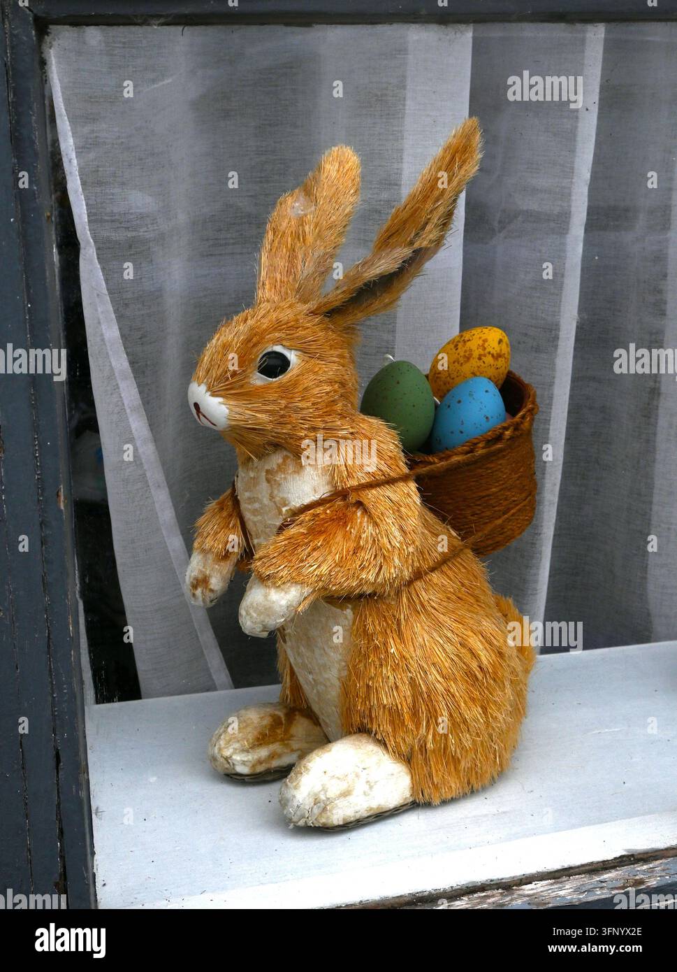 easter bunny figure with easter eggs Stock Photo