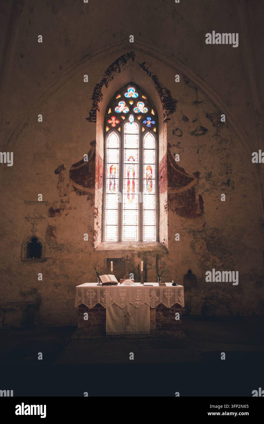 Vector Viewpoint Example View of the altar and stained glass window inside the historic Poide St ...