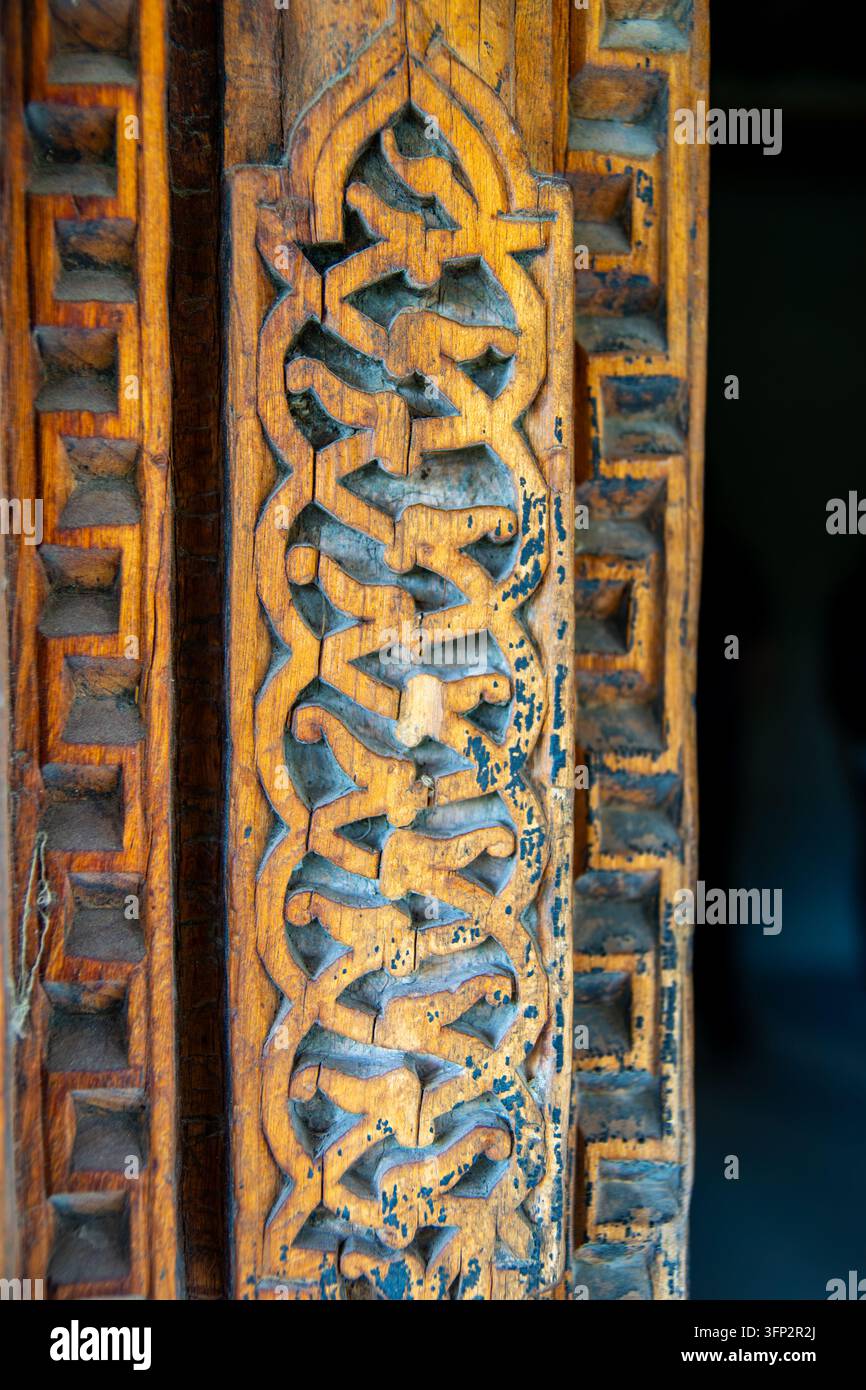 Vector Viewpoint Example View of intricate traditional wooden carvings on a door frame at Khaplu ...