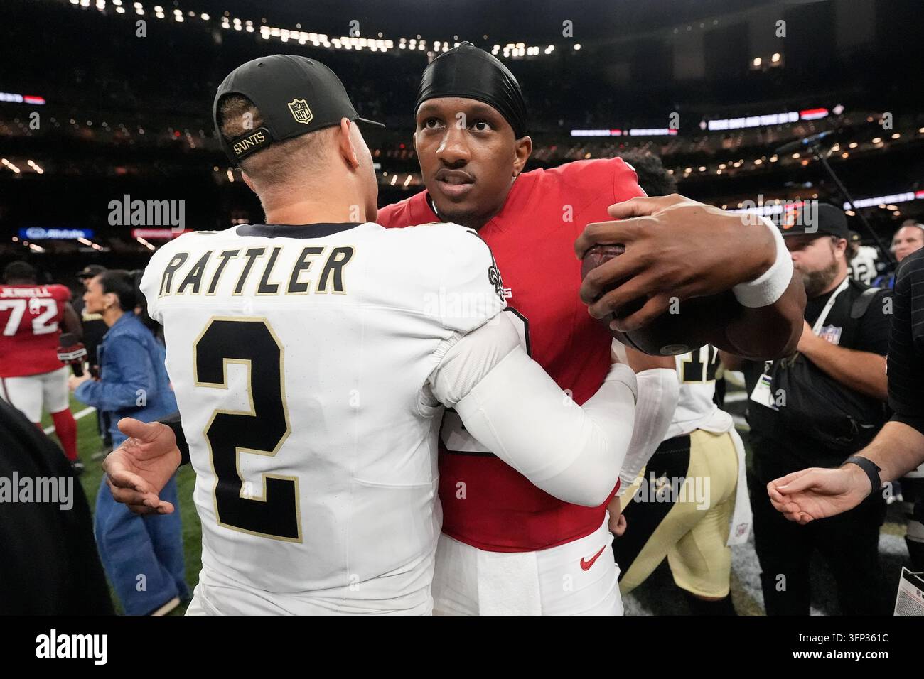 New Orleans Saints quarterback Spencer Rattler (2) hugs Atlanta Falcons ...