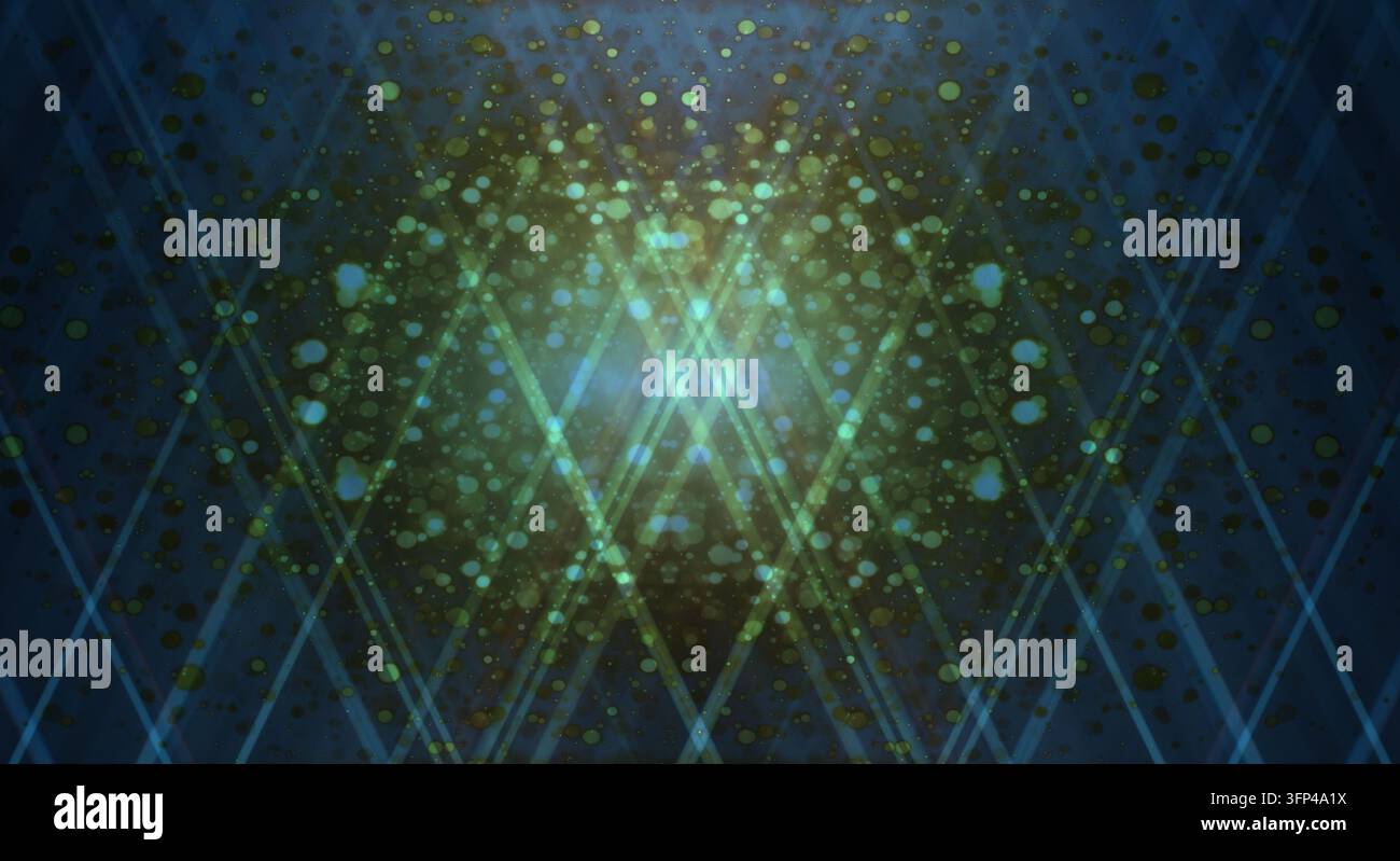 An abstract dark background with blue and green glowing neon diagonal light rays and sparkling particle effects. Stock Photo