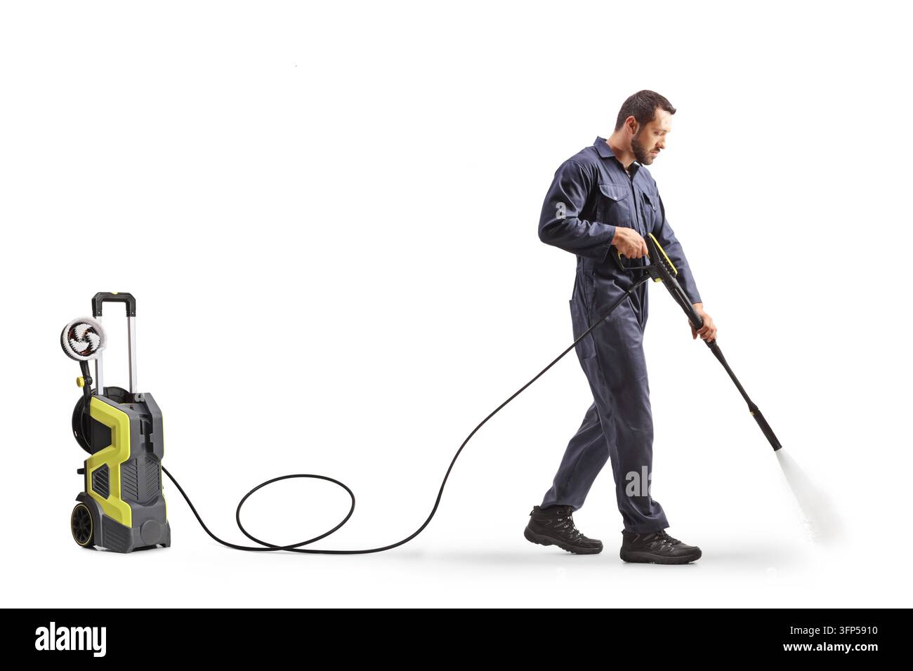 Worker operating a high pressure washer isolated on a white background Stock Photo