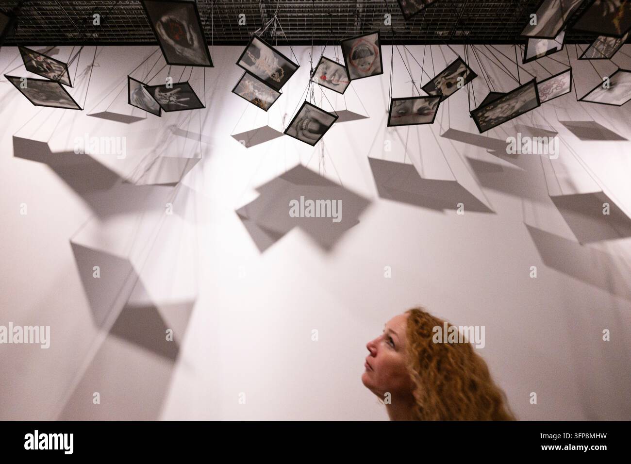 Theq French Rapper Visitor tours the exhibition by French artist Annette Messager, titled ...