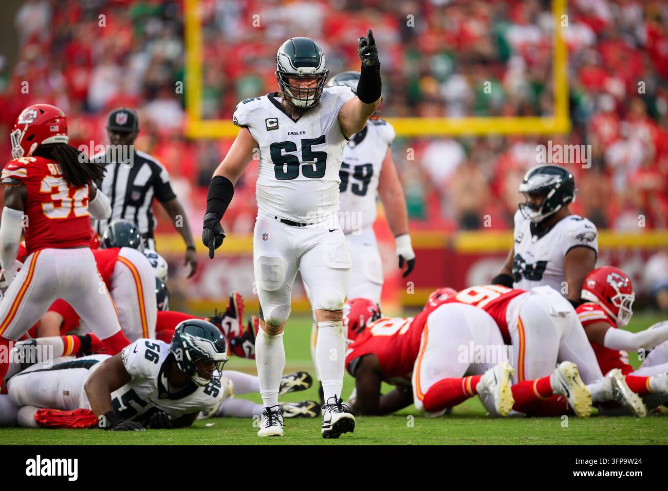 FILE - Philadelphia Eagles offensive tackle Lane Johnson (65) signals a ...